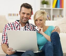 Couple on Laptop with Credit Card