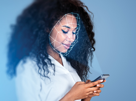 Woman scanning her face on her phone