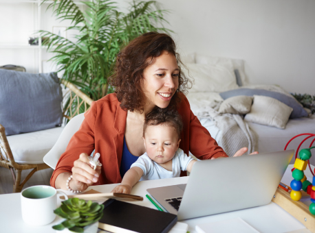 Mom working from home with baby