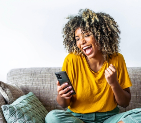 happy woman looking at phone